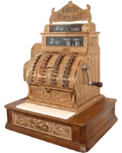 An antique brass National cash register